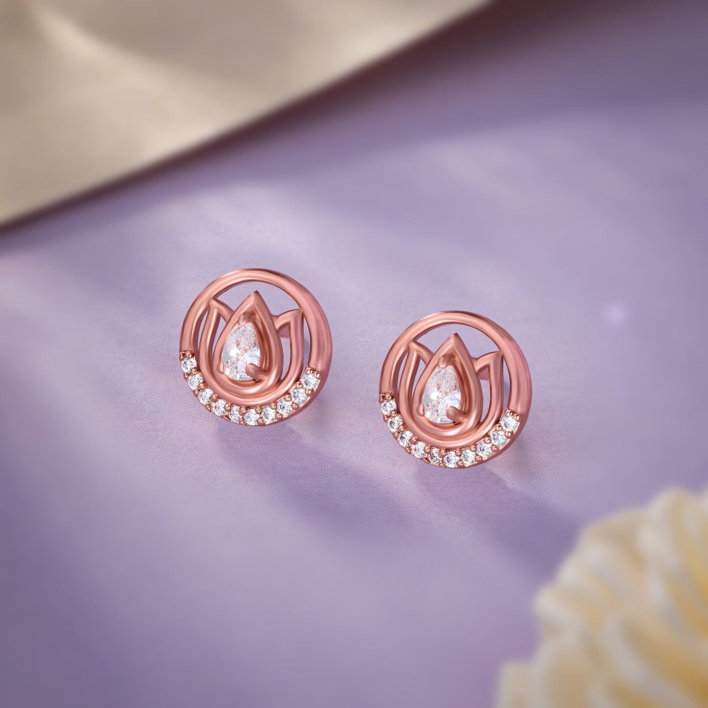 the rose gold earrings with stones