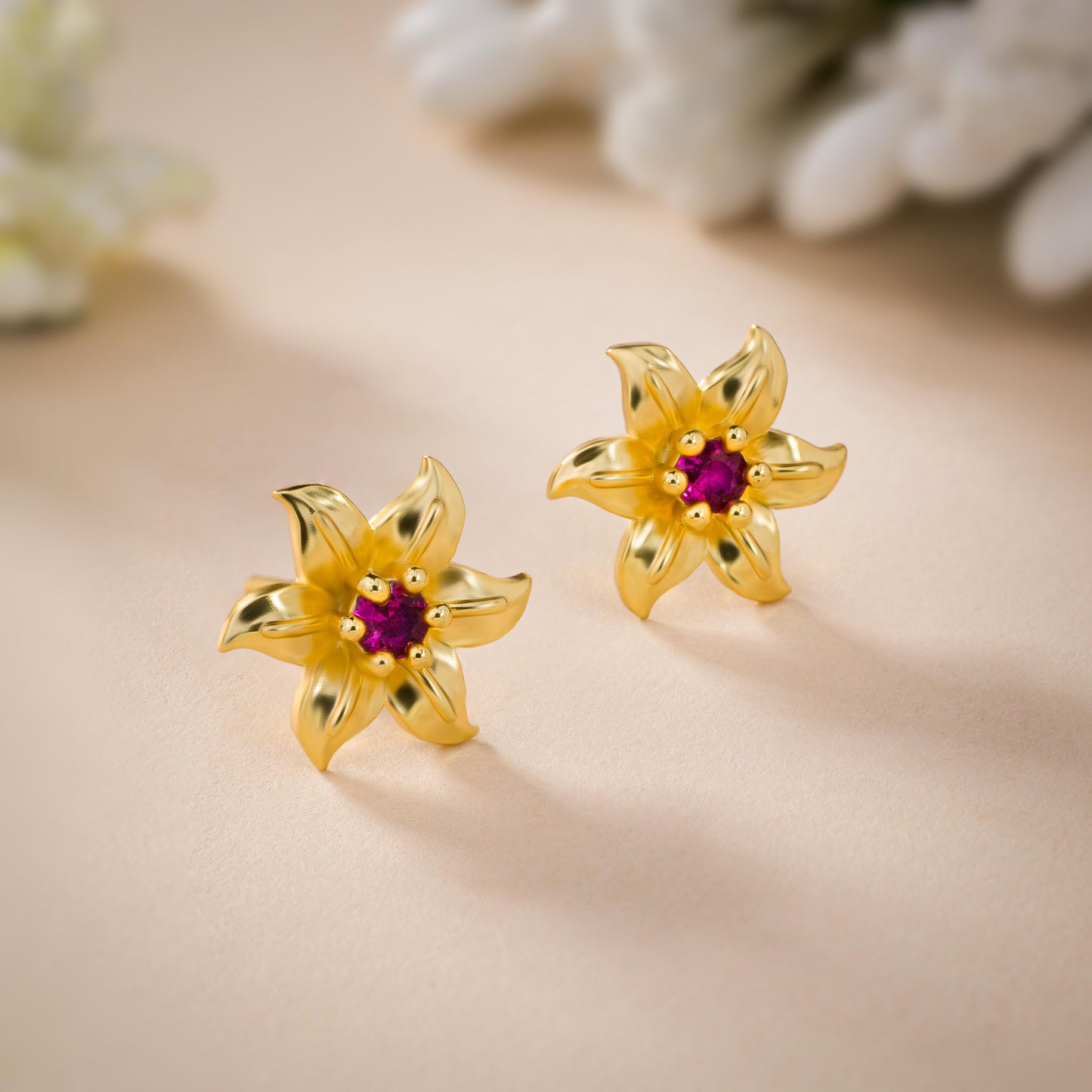 red blooming star studs