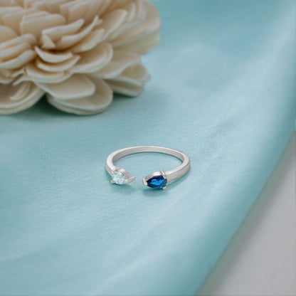 Silver Ring with a Blue Stone and a Diamond