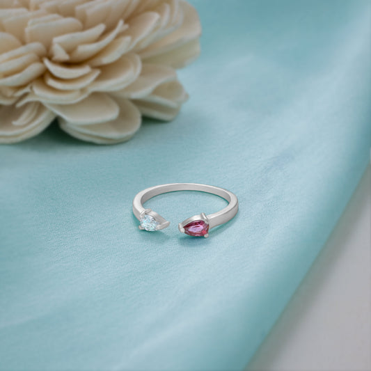 Silver Ring with a Pink Stone and a Diamond