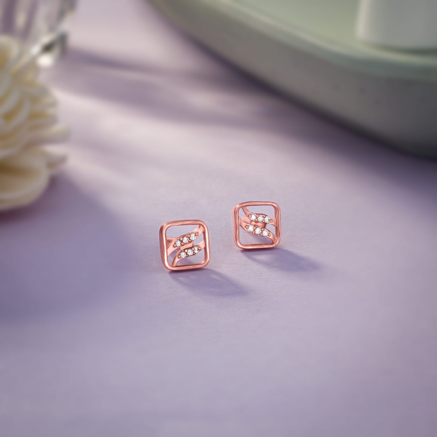 rose gold earrings with diamonds