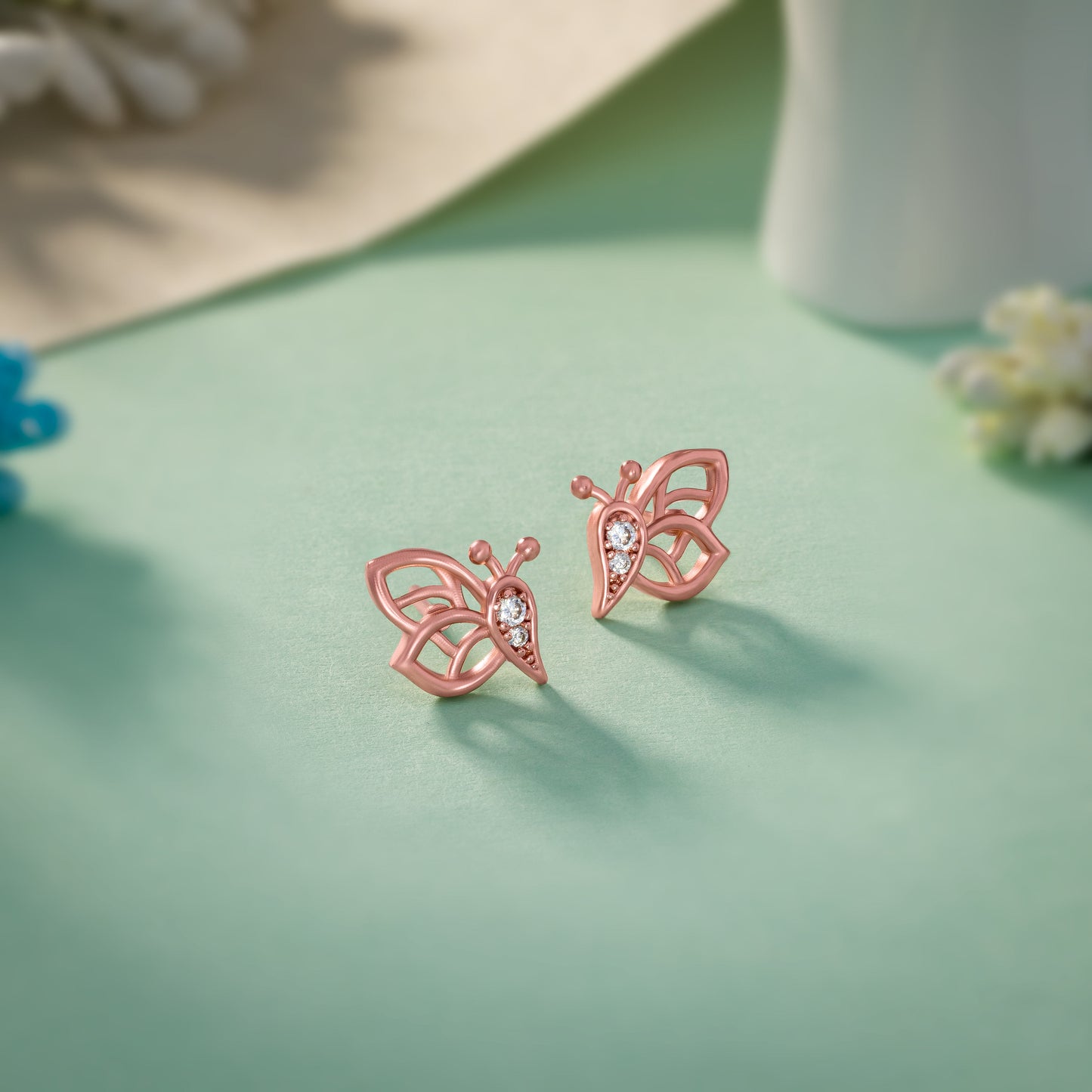 butterfly earring rose gold and diamonds