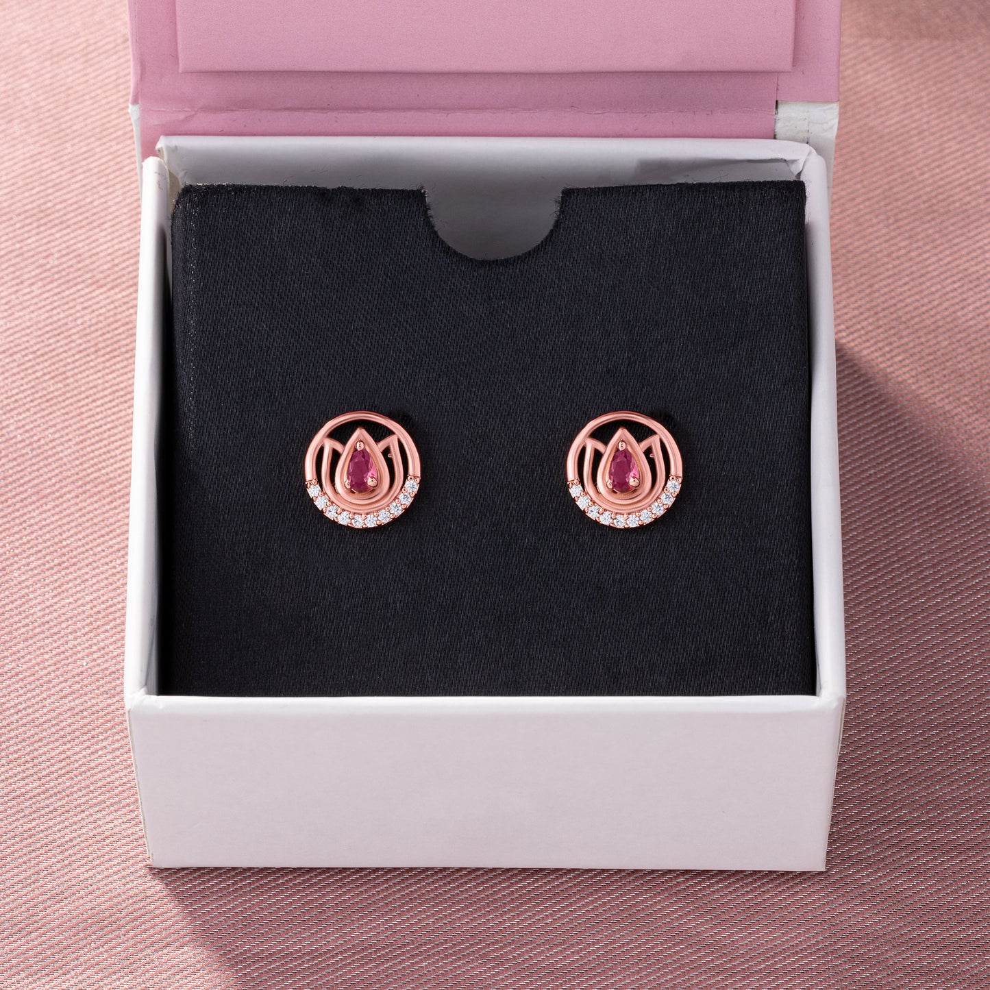 the rose gold earrings with stones