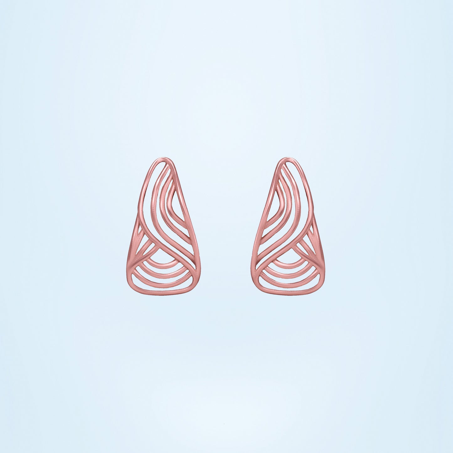 pair of rose gold earrings