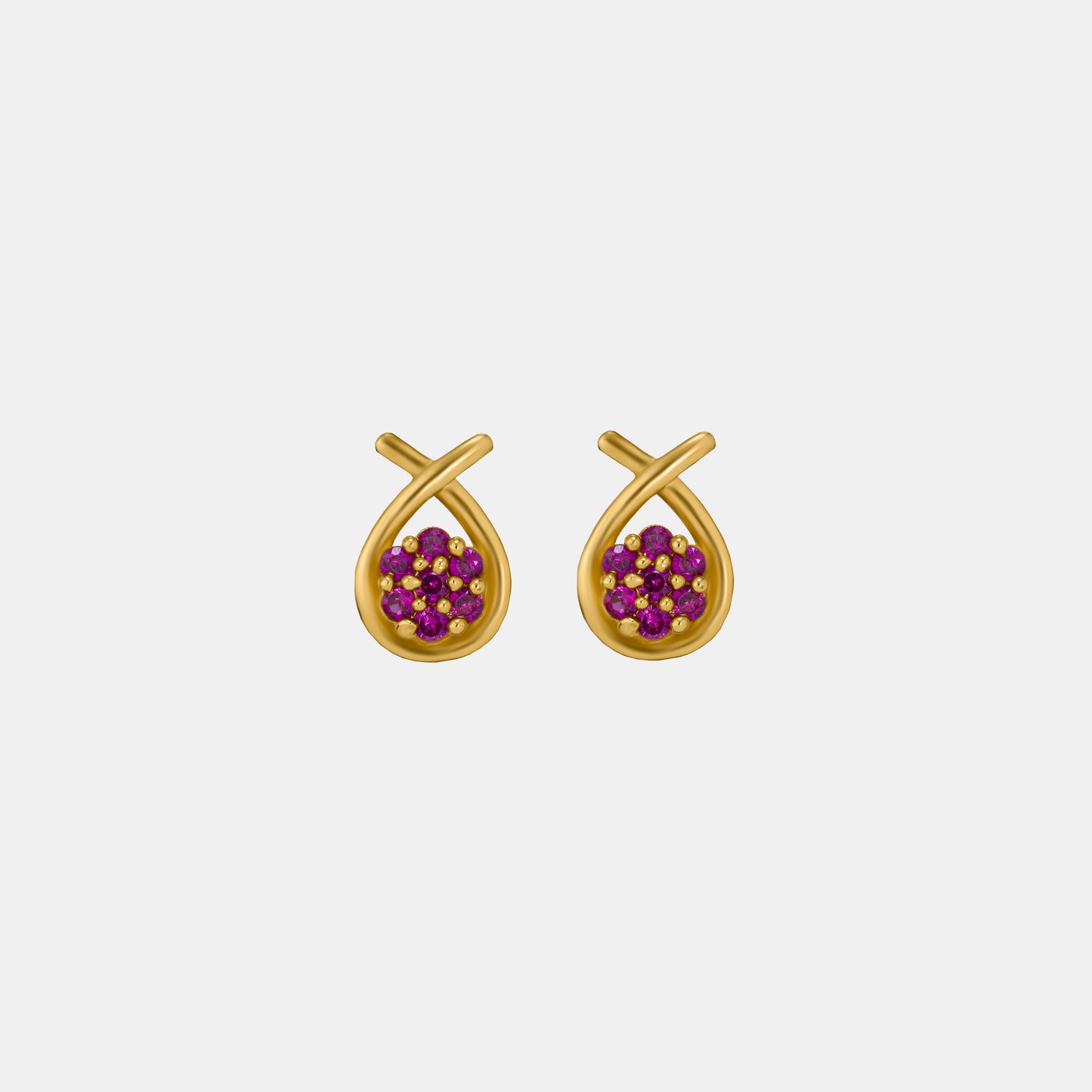 pair of golden earrings with white stones