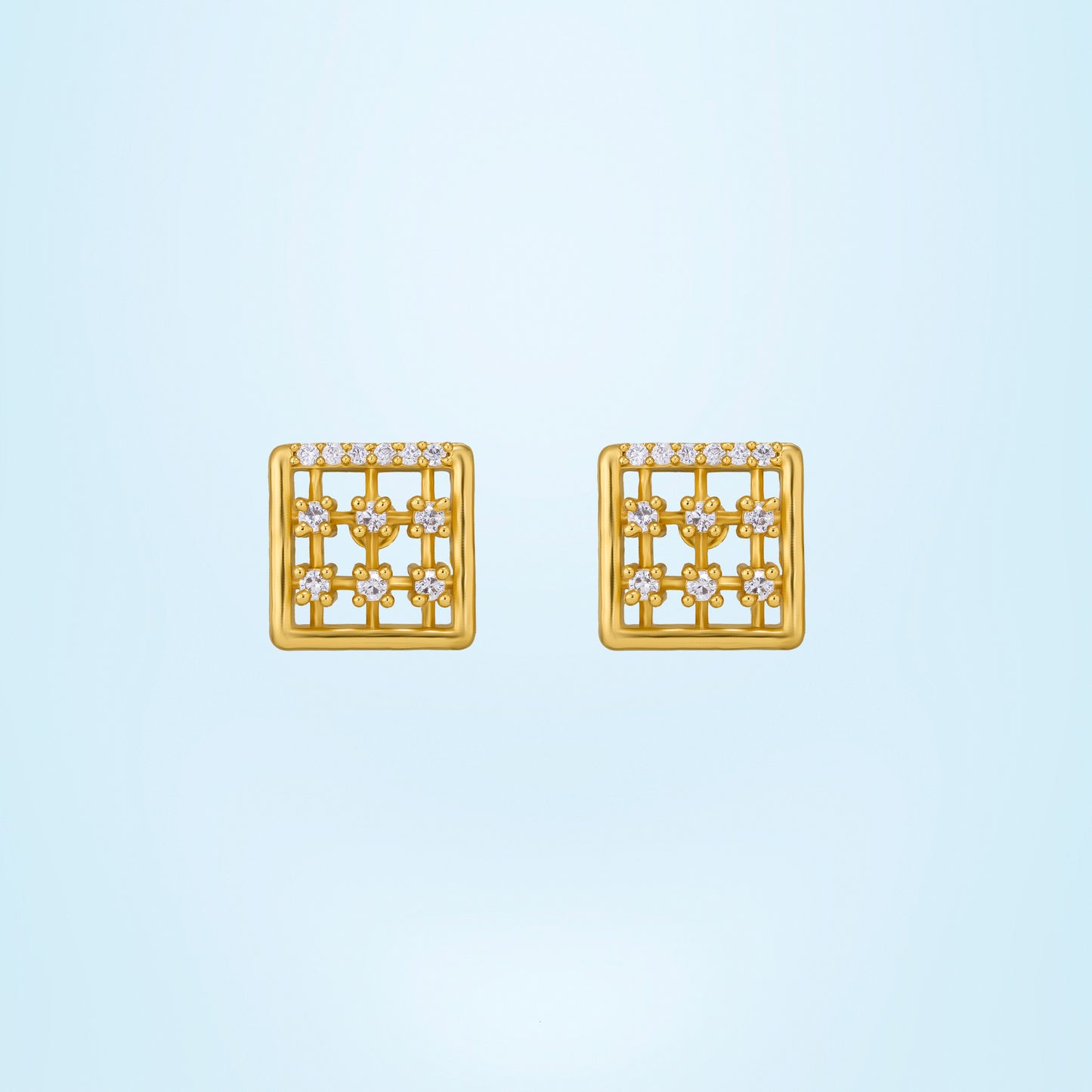 pair of golden earrings with diamonds