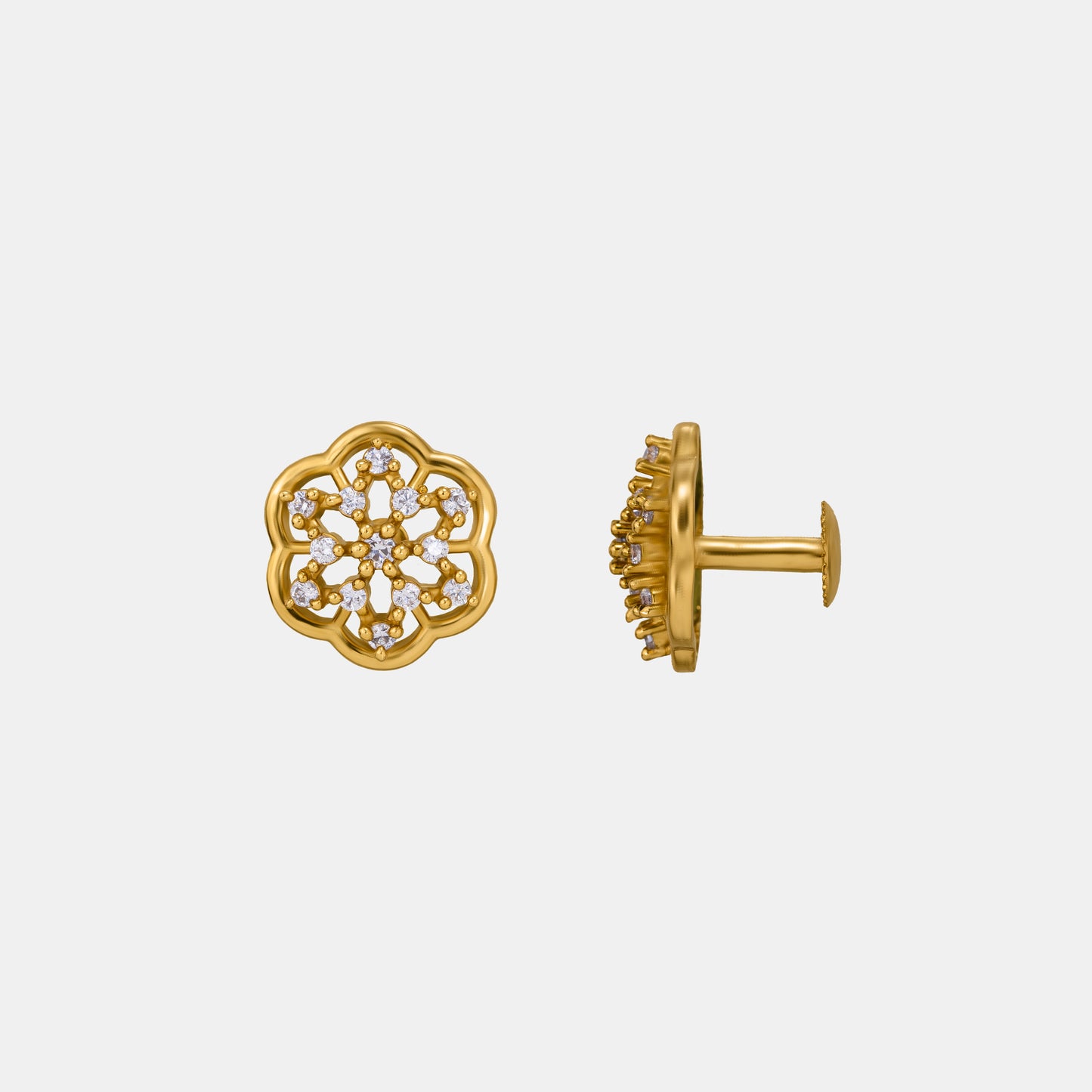 pair of golden earrings with white diamonds