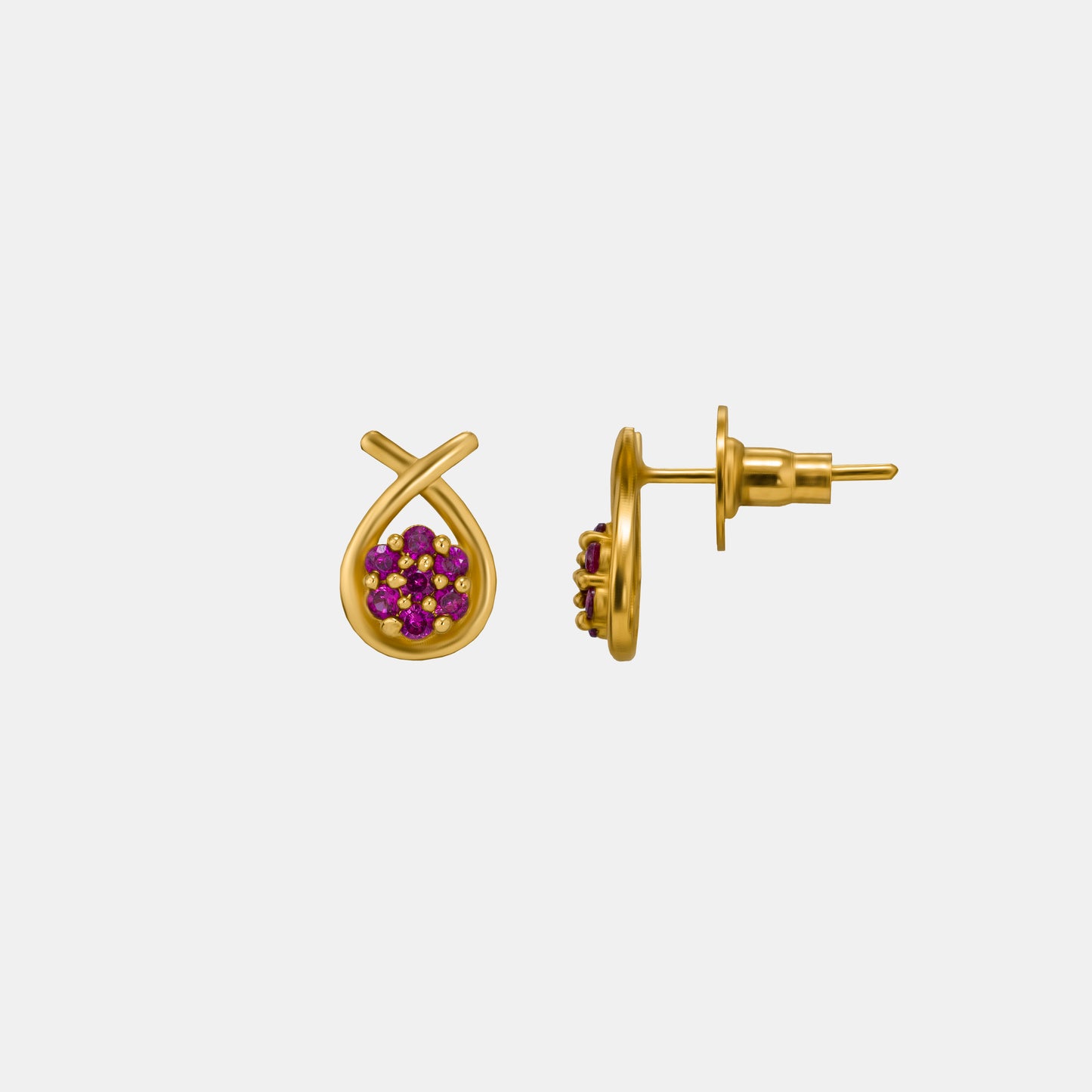 pair of golden earrings with white stones