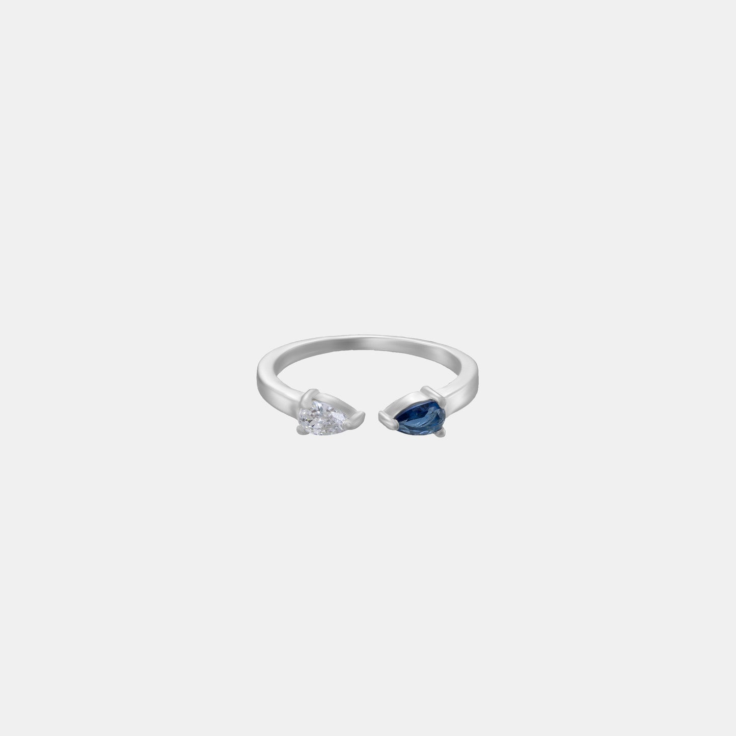 silver ring with a blue stone and a diamond