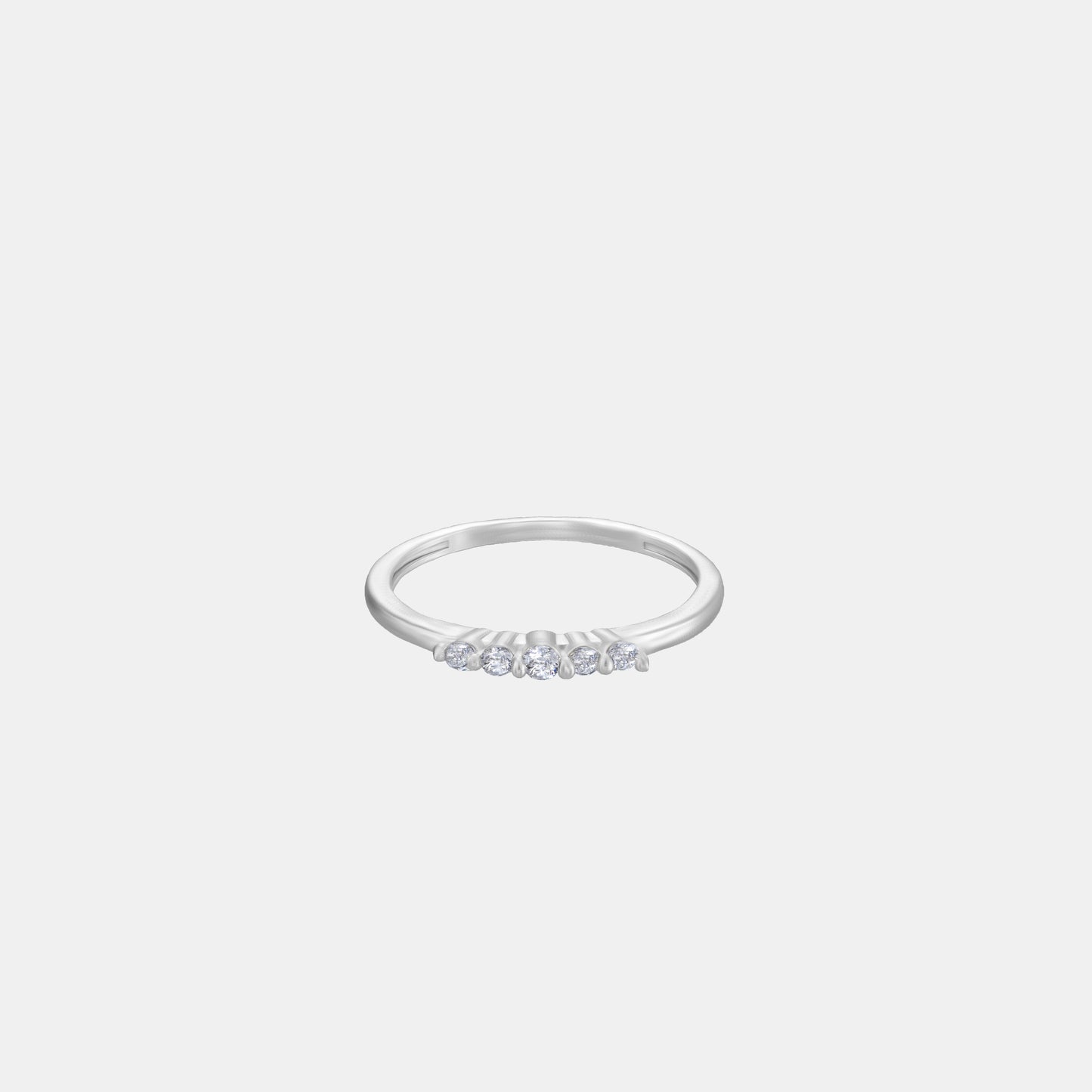 silver ring with a diamond on it