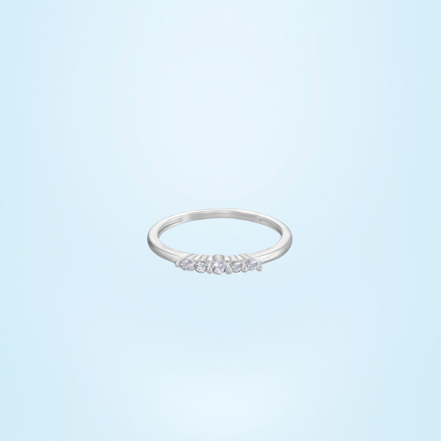 silver ring with a diamond on it