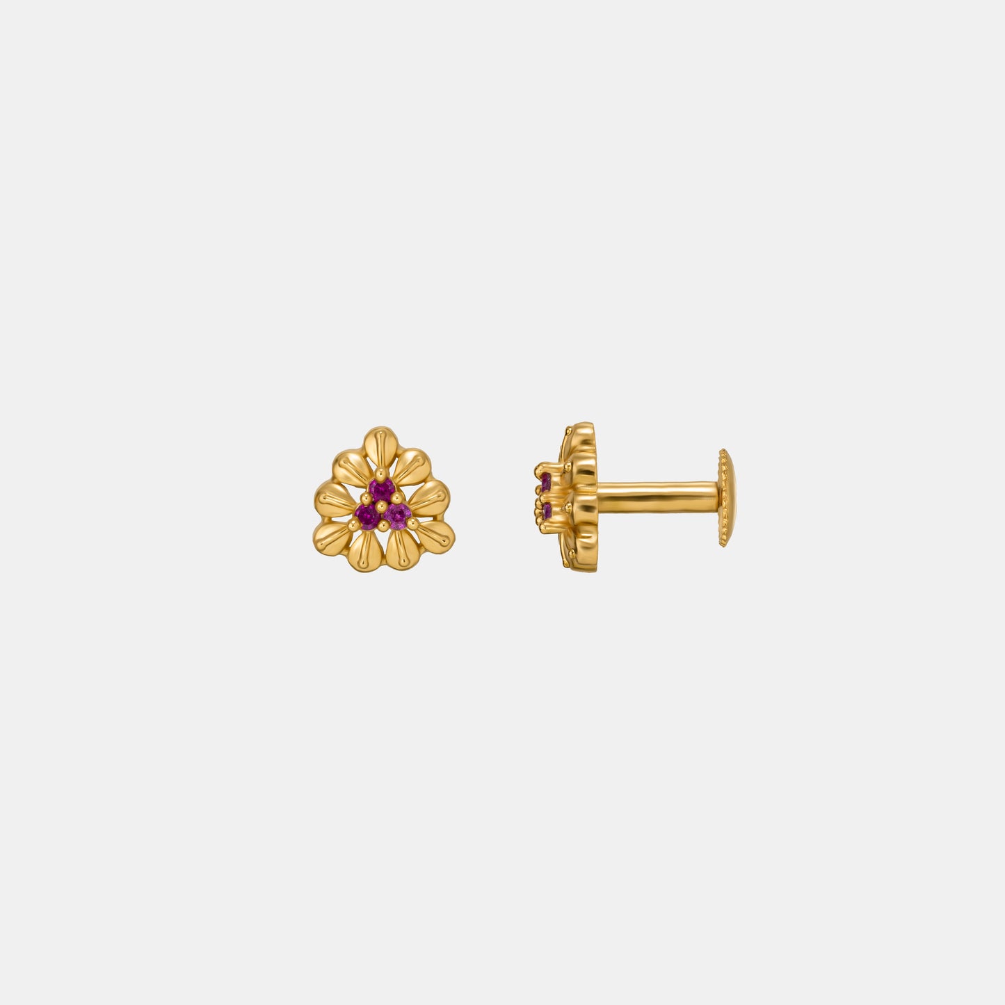 pair of golden and flower earrings