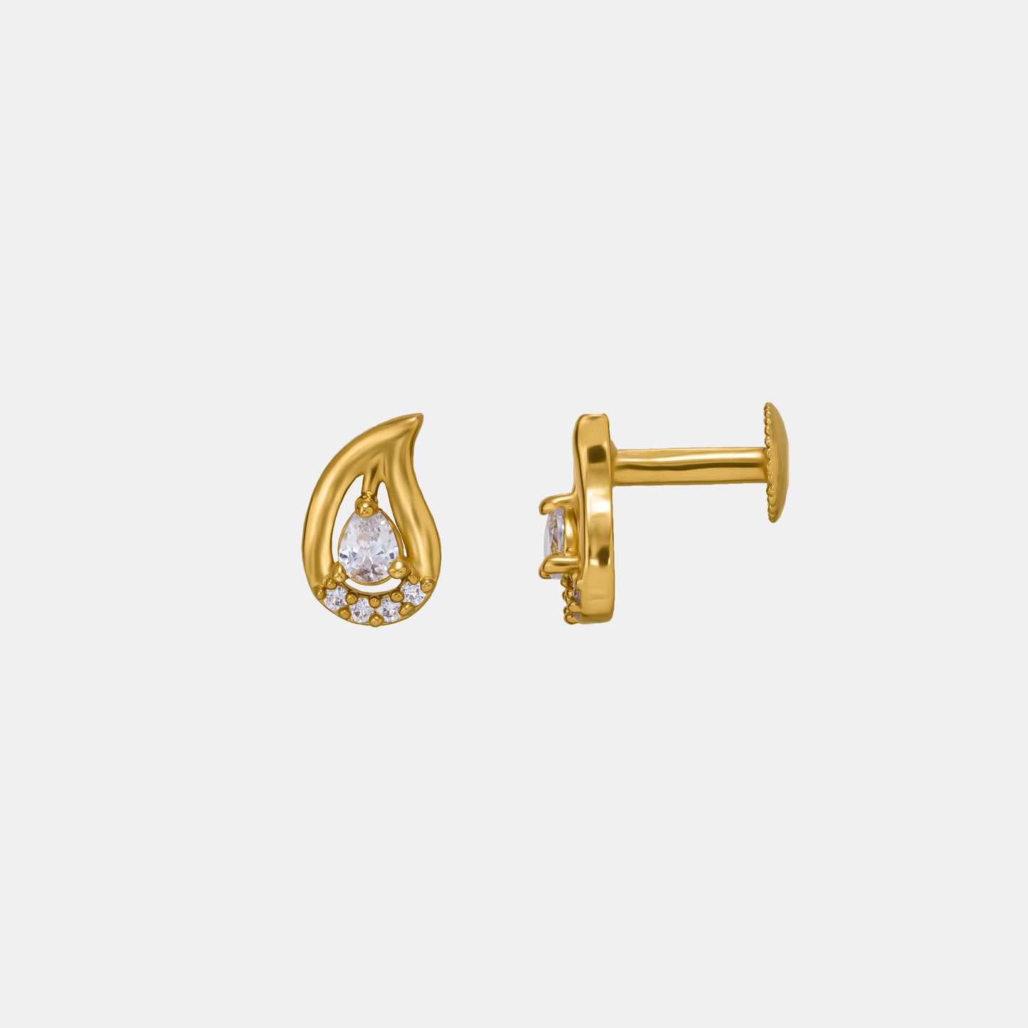 pair of golden earrings with stones