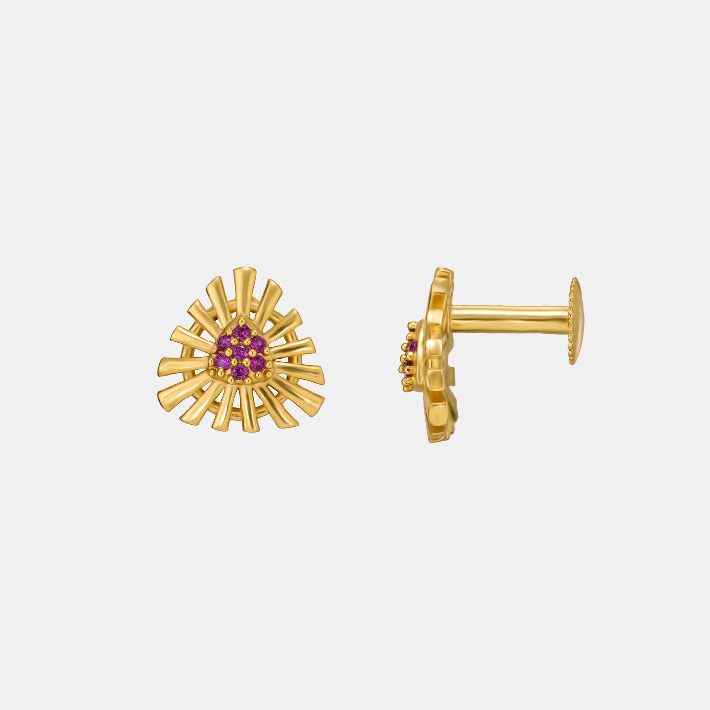 pair of golden earrings with stones