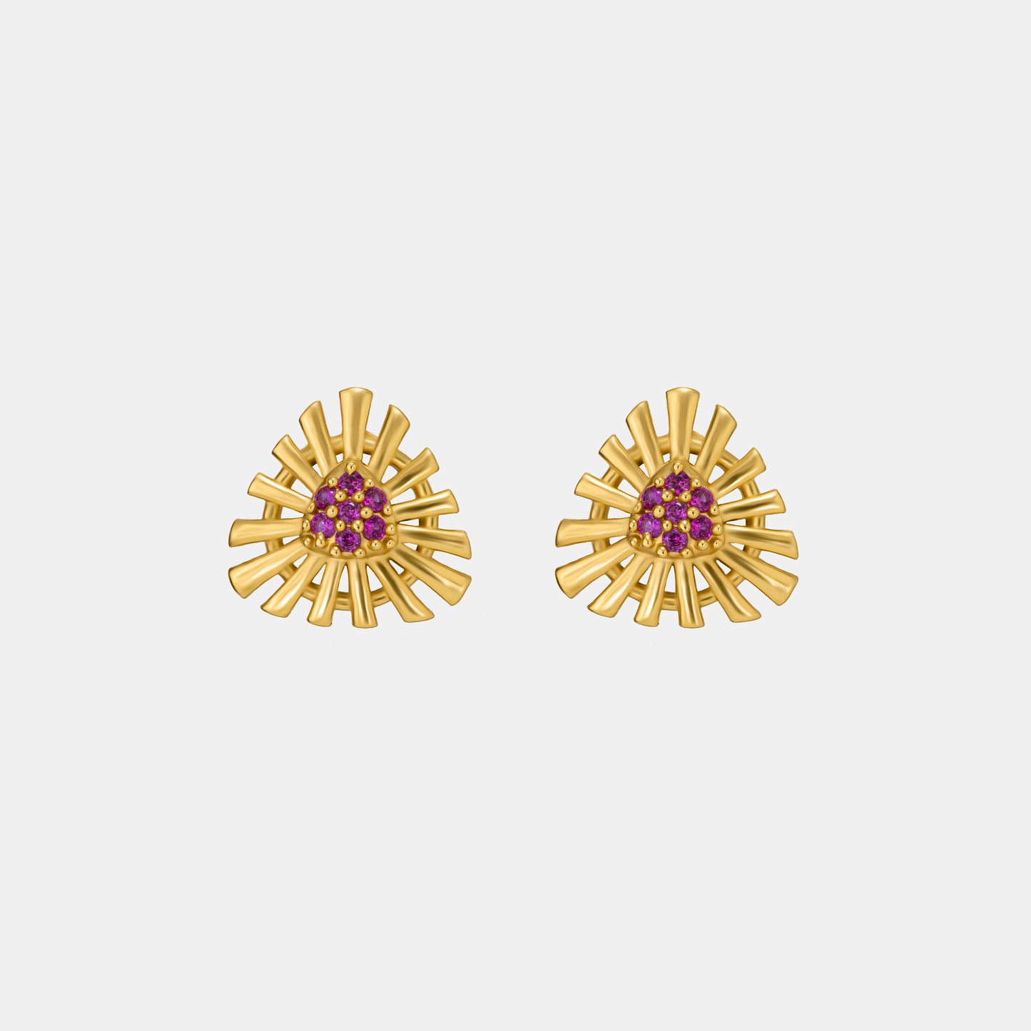 pair of golden earrings with stones