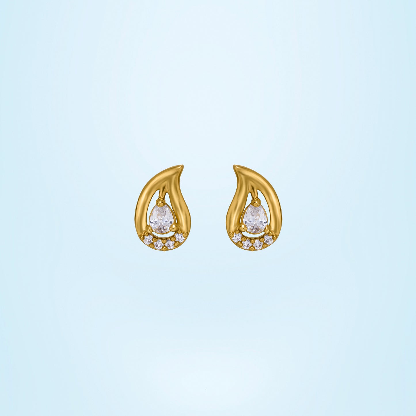 pair of golden earrings with white stones