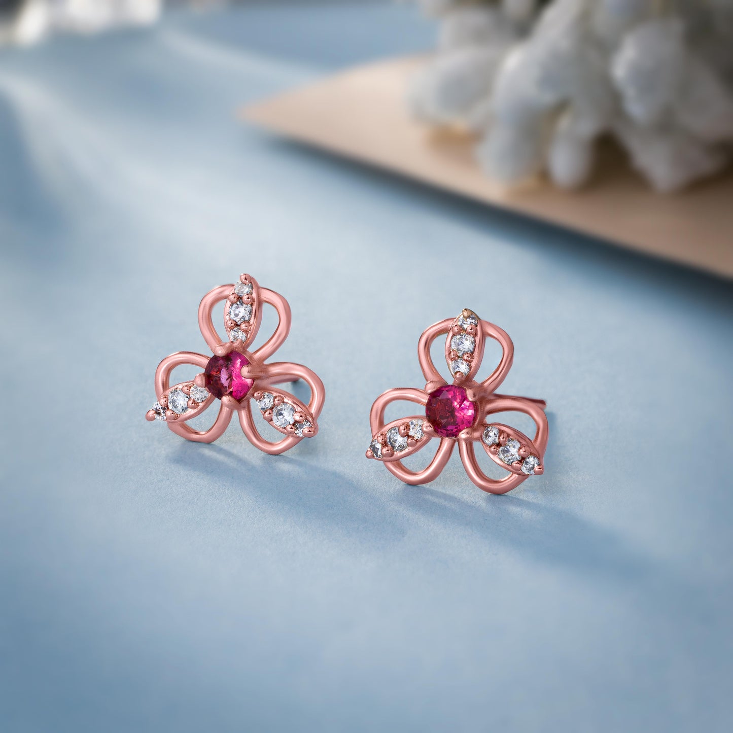 rose gold earrings with ruby stones