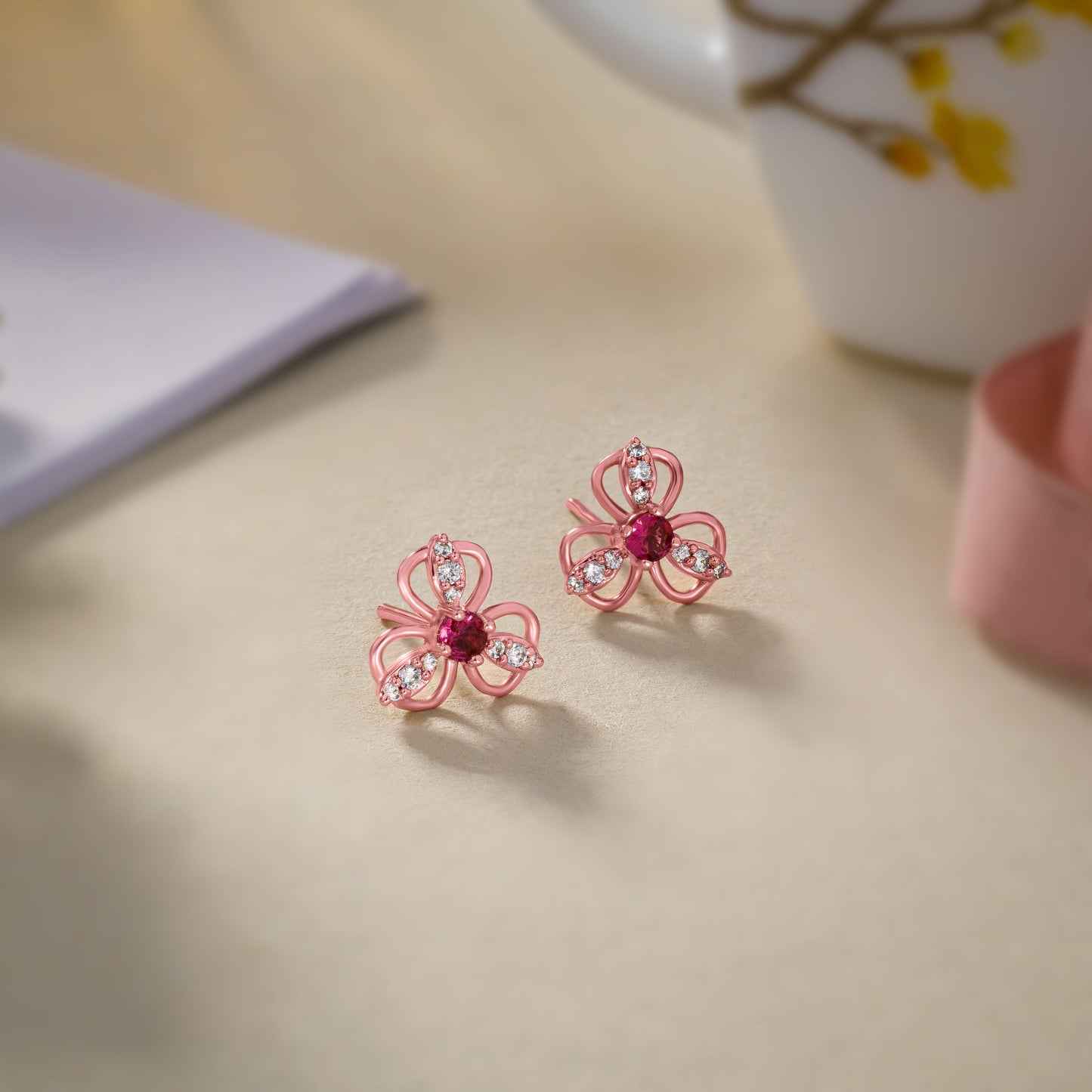 rose gold earrings with ruby stones