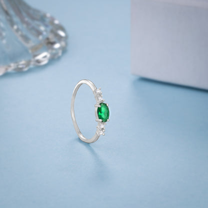 Silver Ring with a Sapphire and Green Diamonds