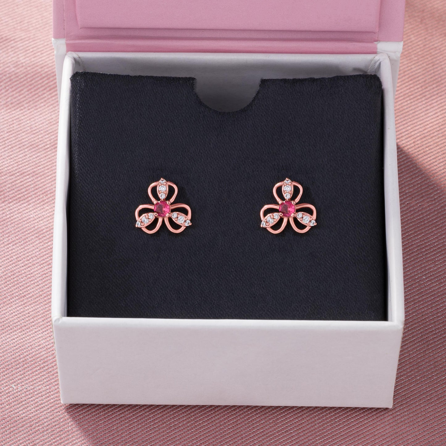 rose gold earrings with ruby stones