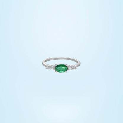 Silver Ring with a Sapphire and Green Diamonds