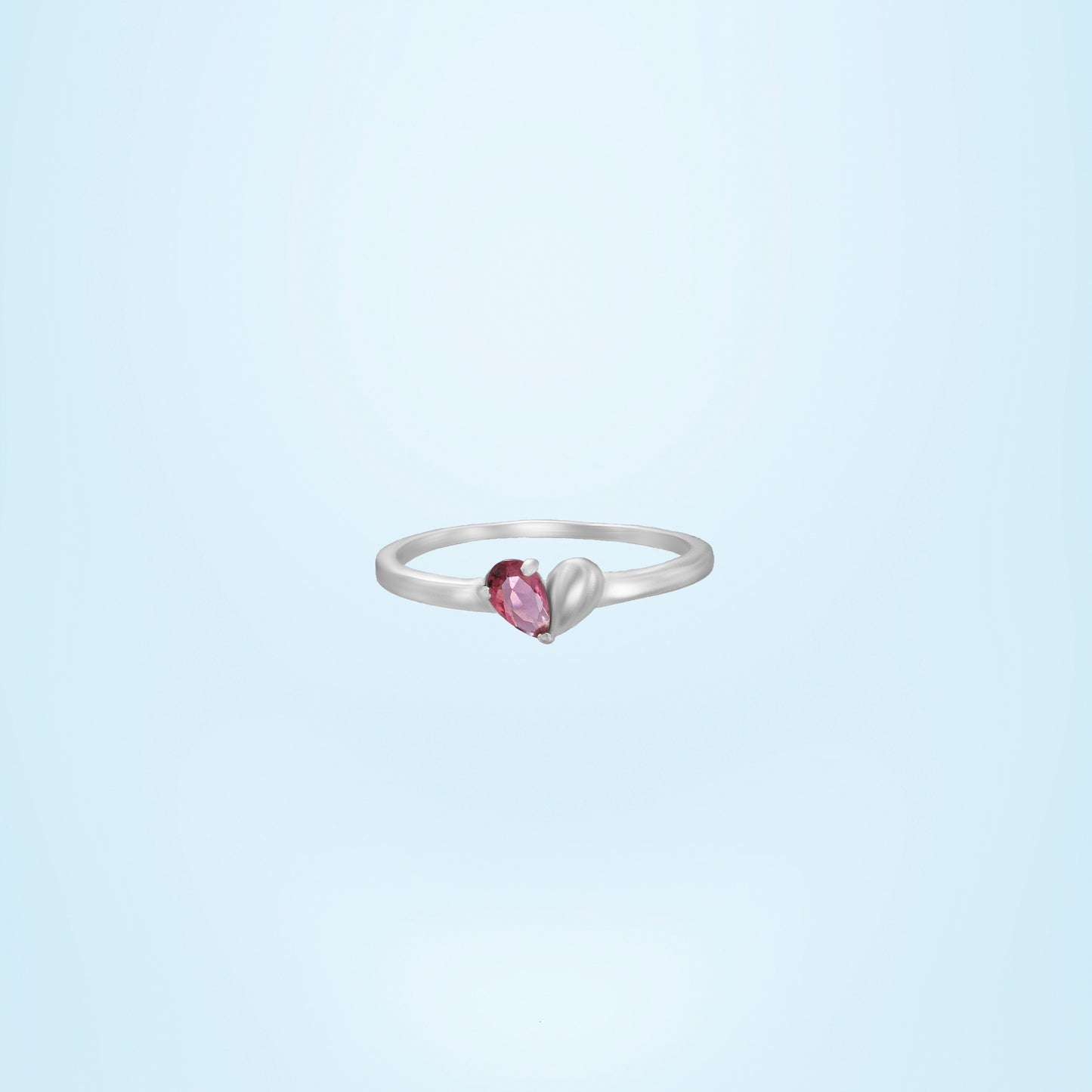 silver ring with a ruby stone