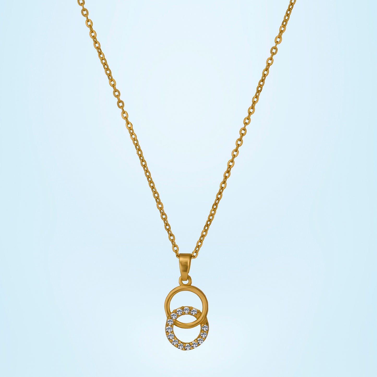 golden necklace with a diamond pendant