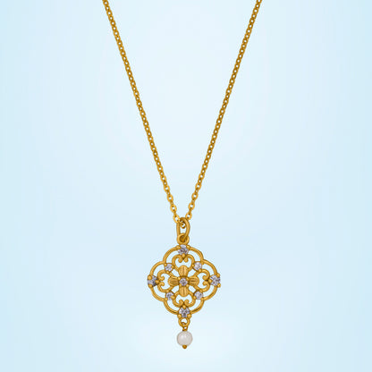 Golden Necklace with a Flower Design on it