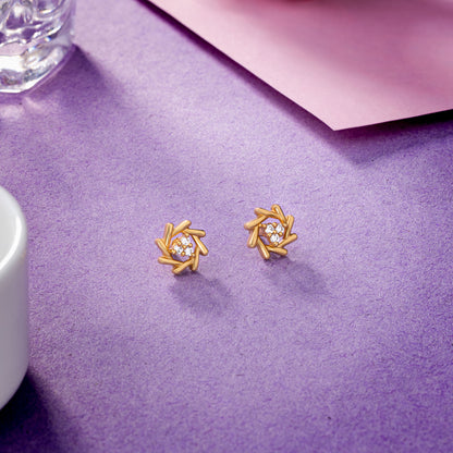 Pair of Golden Earrings with a Diamond