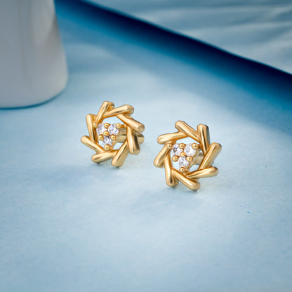 Pair of Golden Earrings with a Diamond