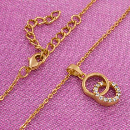 Golden necklace with a diamond pendant