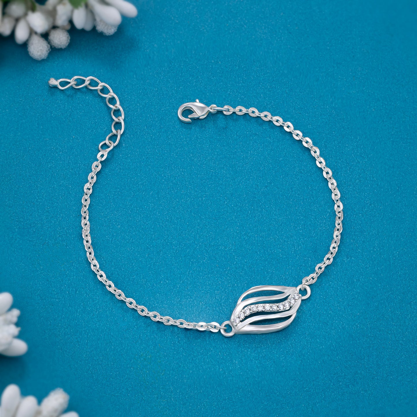 silver bracelet with a diamond accent