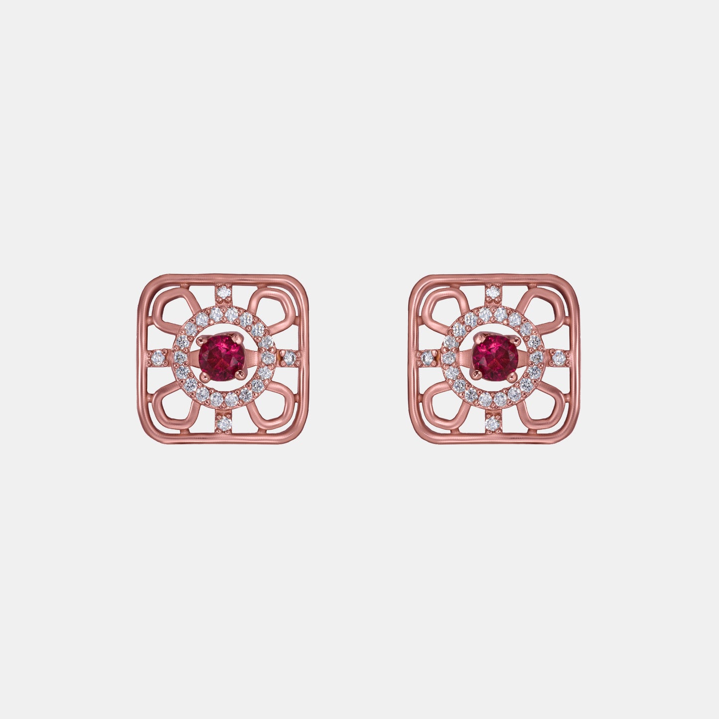 ruby earrings set in rose gold