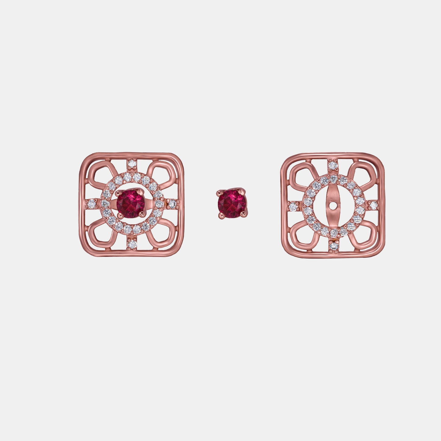 ruby earrings set in rose gold