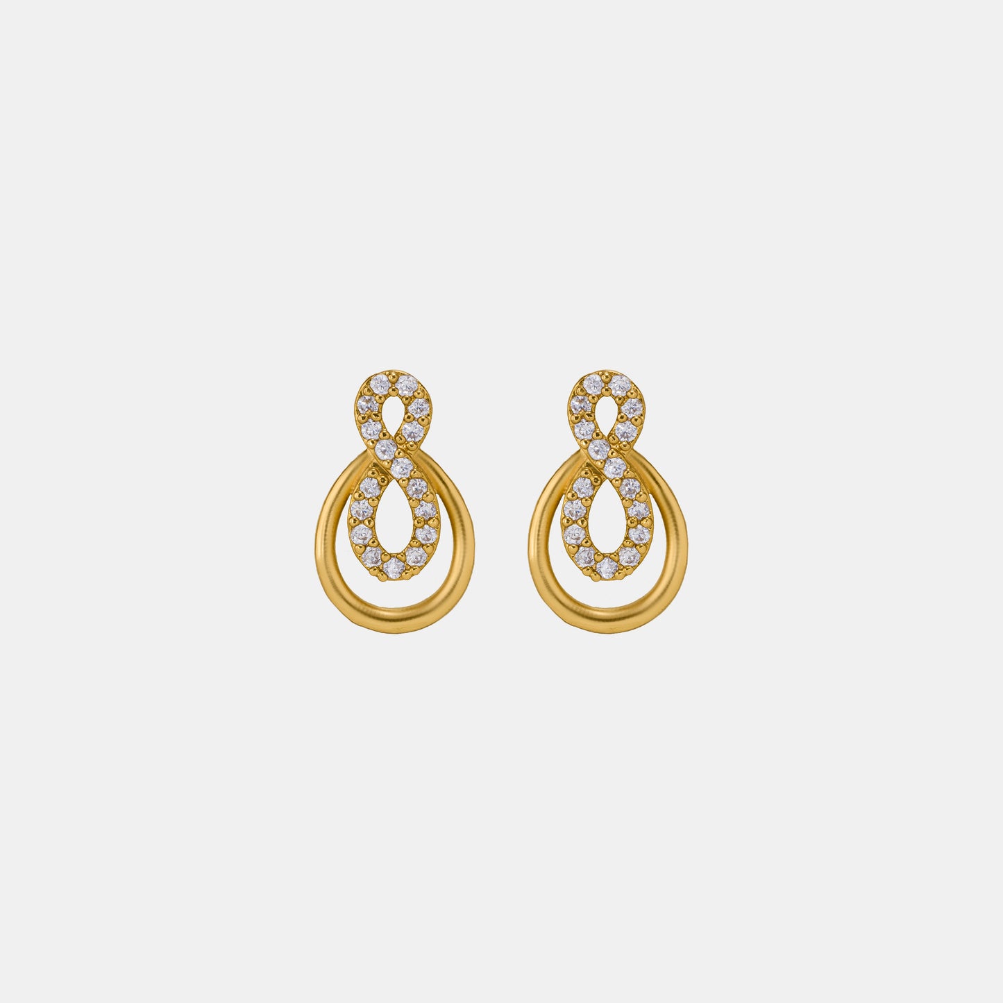 pair of golden earrings with diamonds