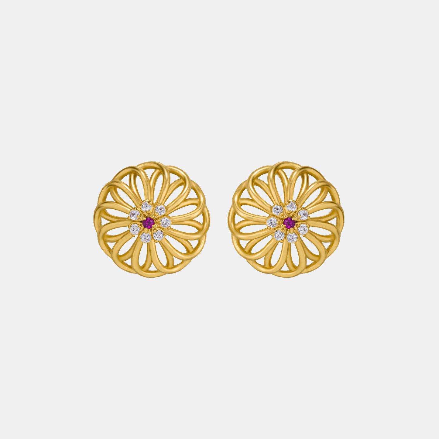 pair of golden earrings with diamonds and ruby