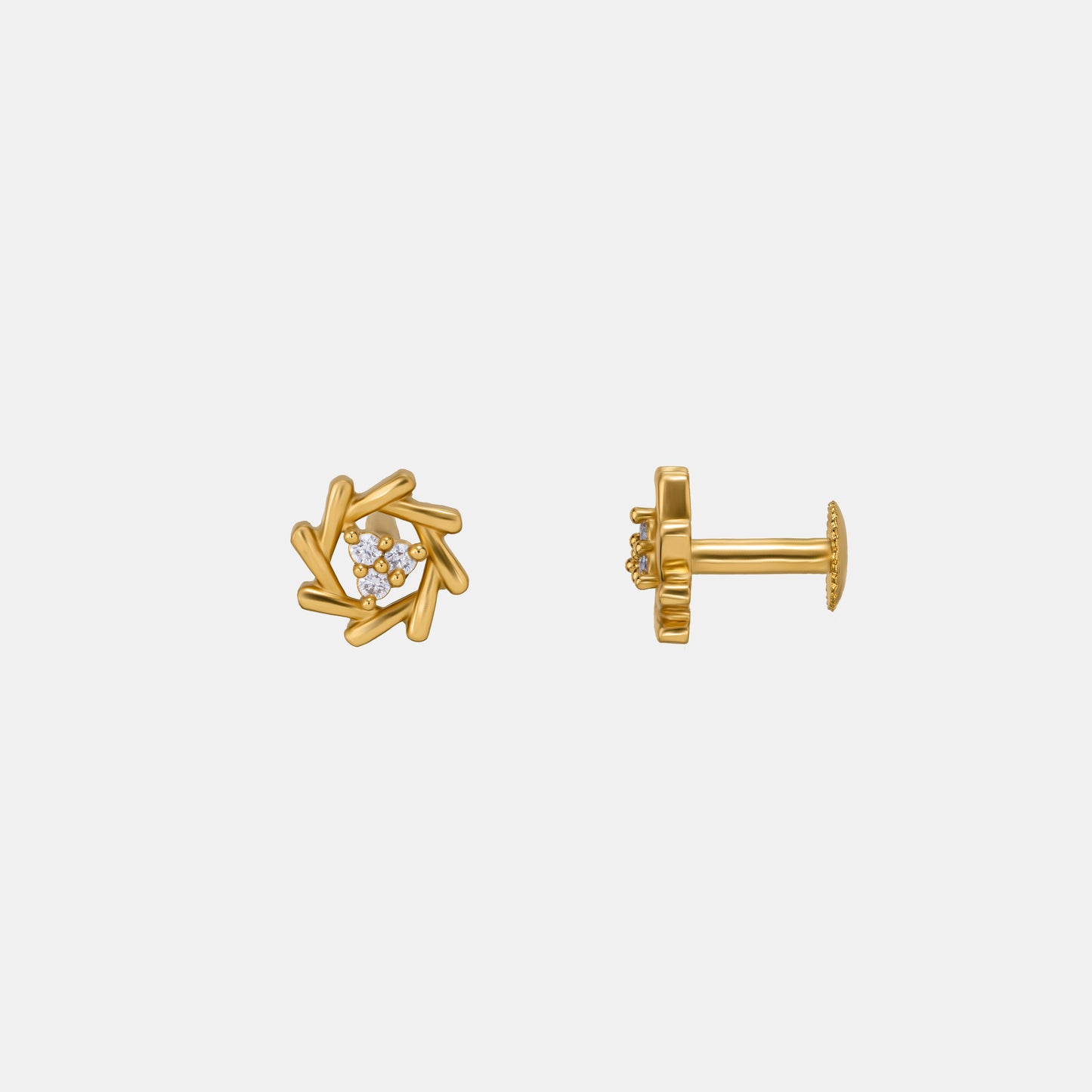 pair of golden earrings with a diamond