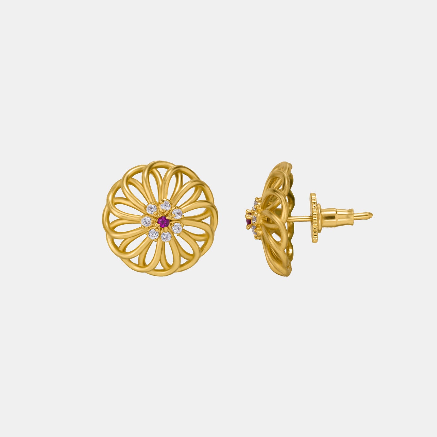 pair of golden earrings with diamonds and ruby