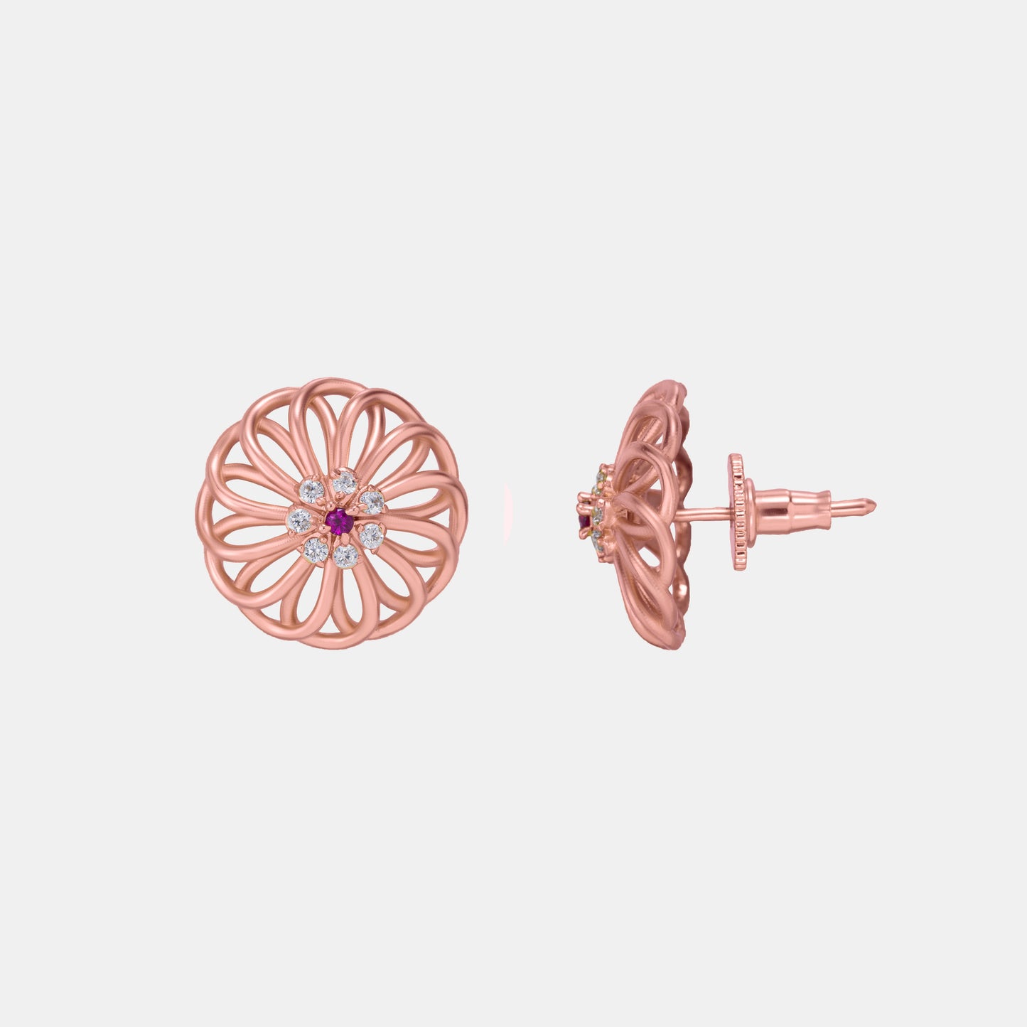 pair of rose gold earrings with diamonds and ruby