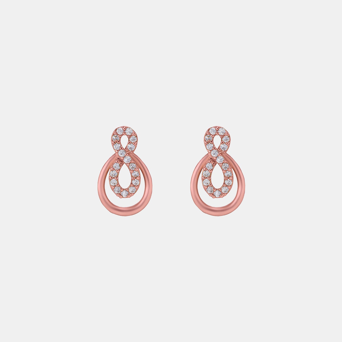 pair of rose gold earrings with diamonds