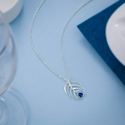 Silver Necklace with a Blue Stone