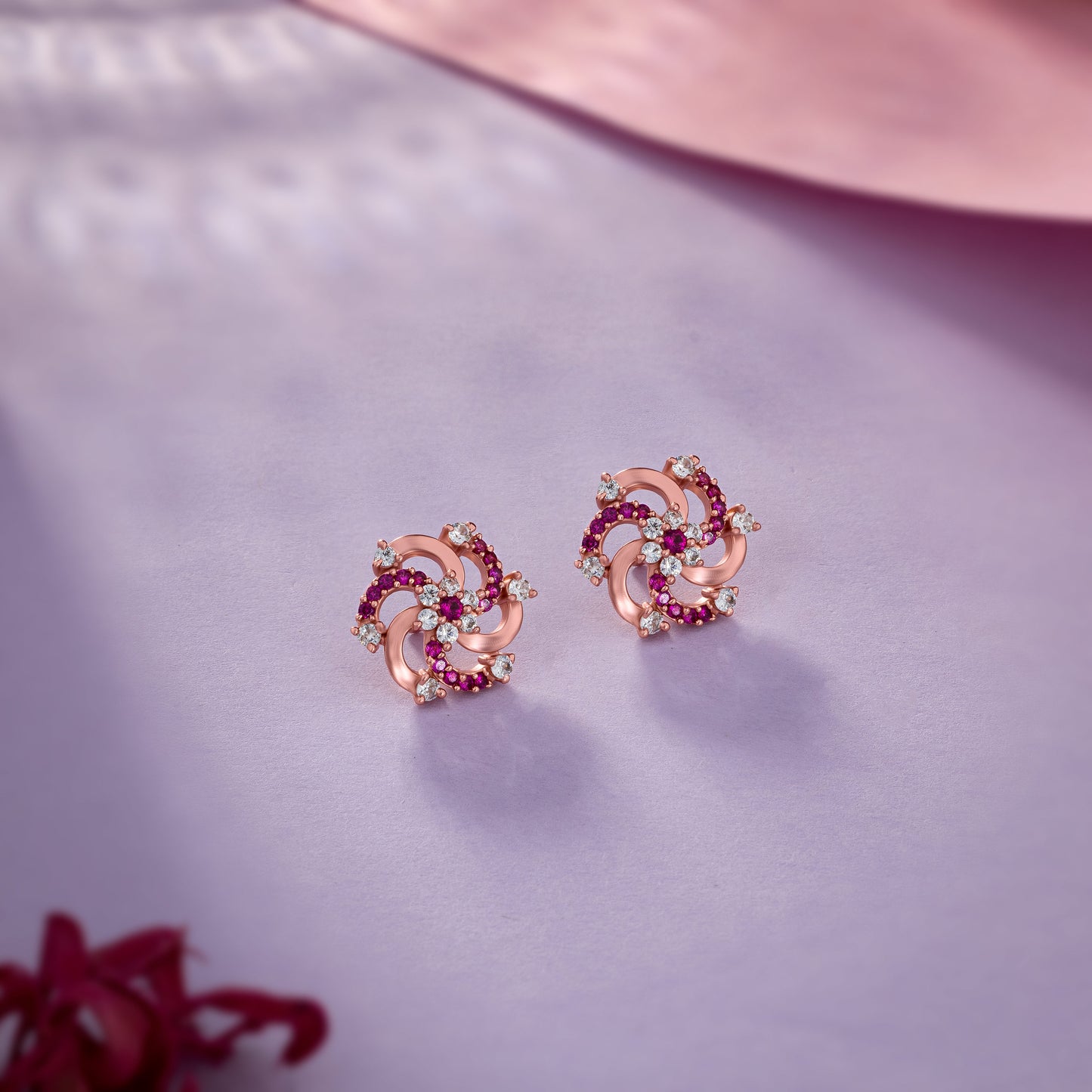 red diamond and rose gold earrings