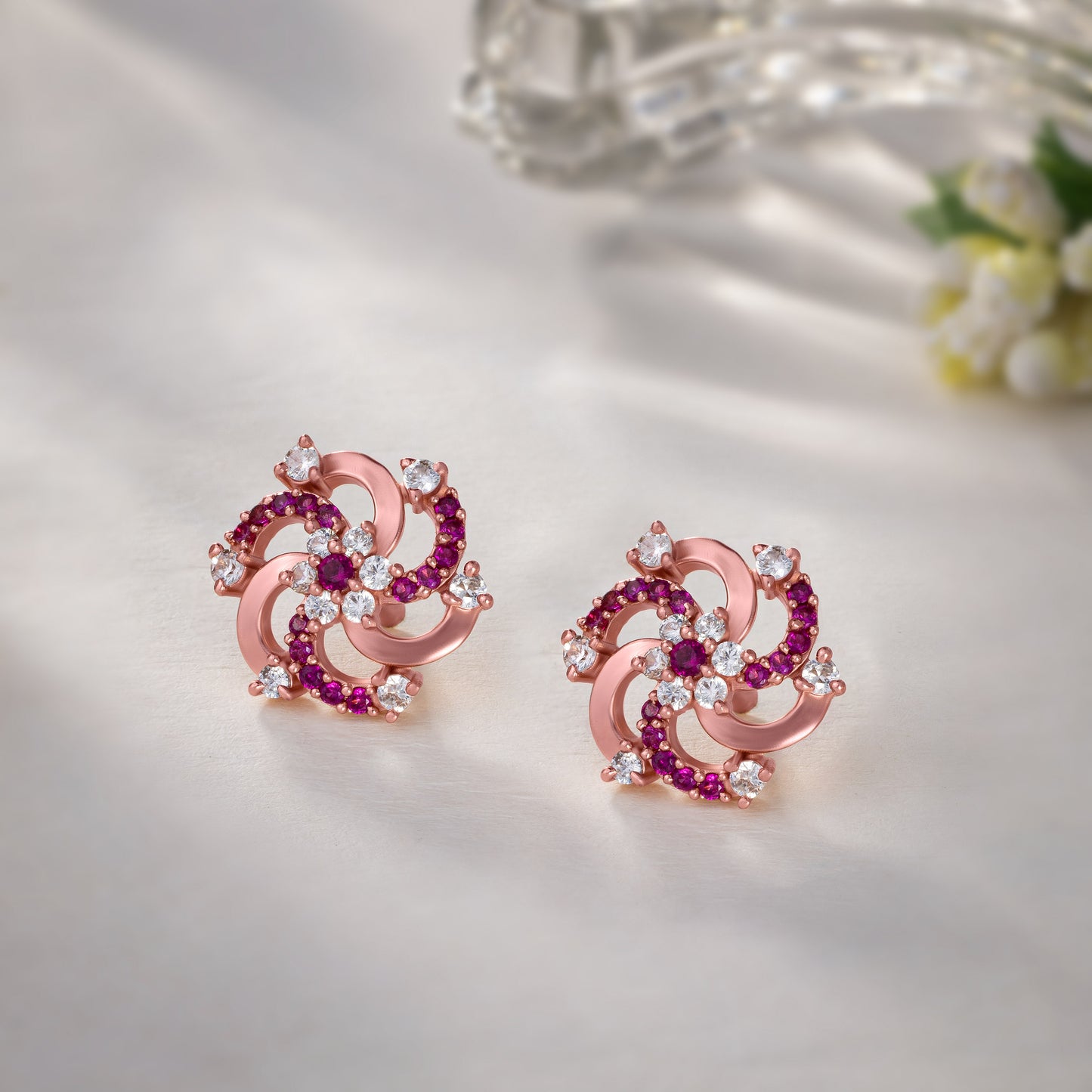 red diamond and rose gold earrings