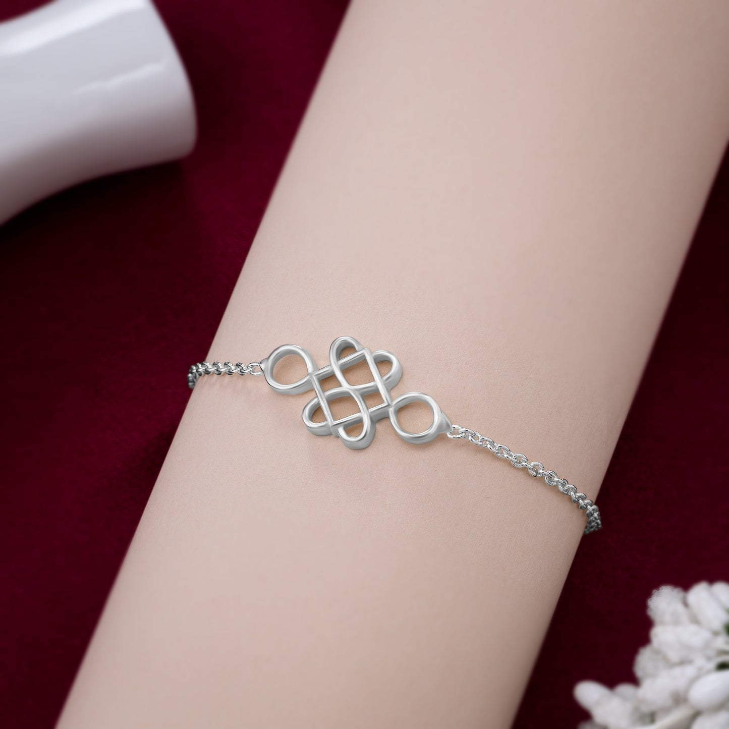 silver bracelet with a beautiful knot