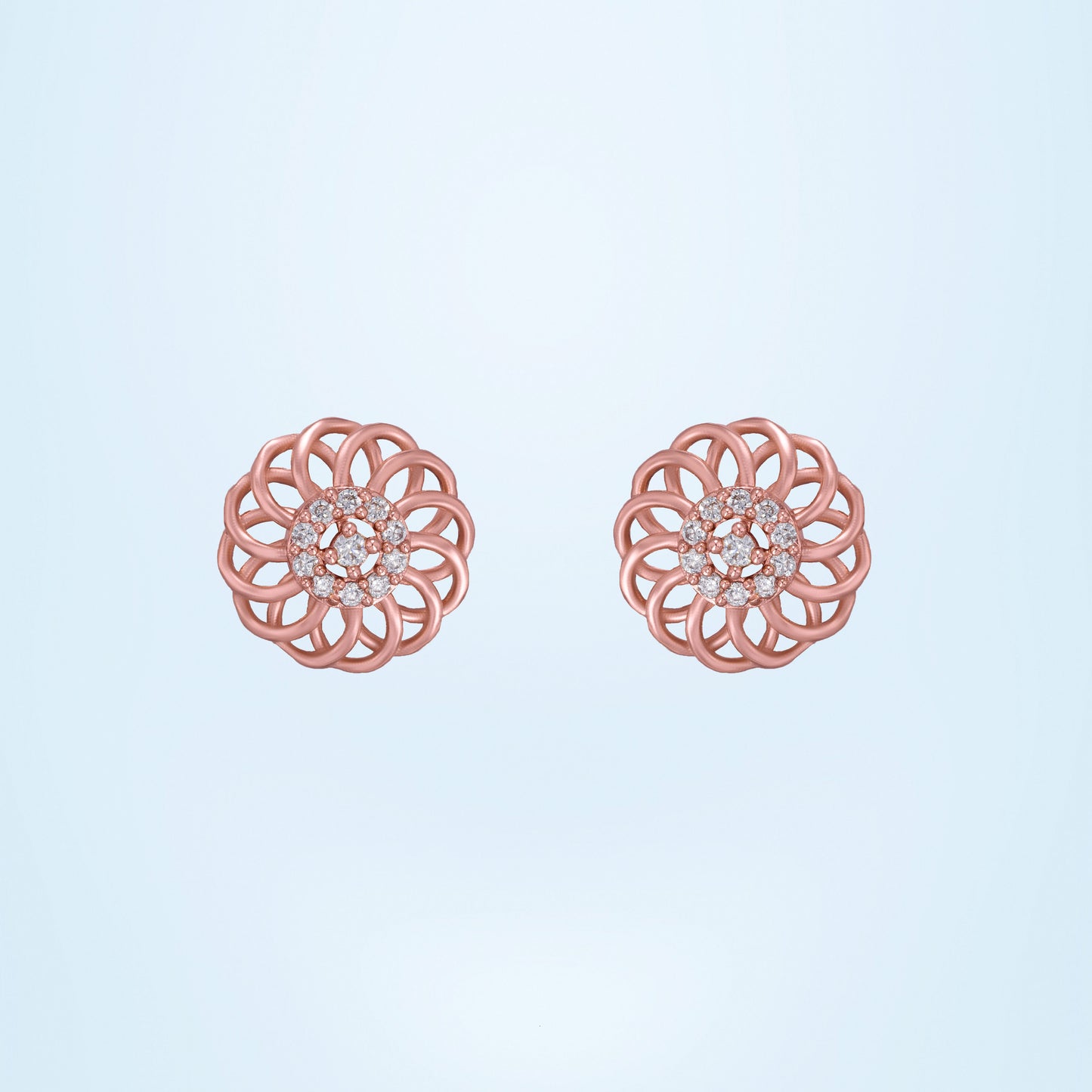 pair of rose gold earrings with diamonds