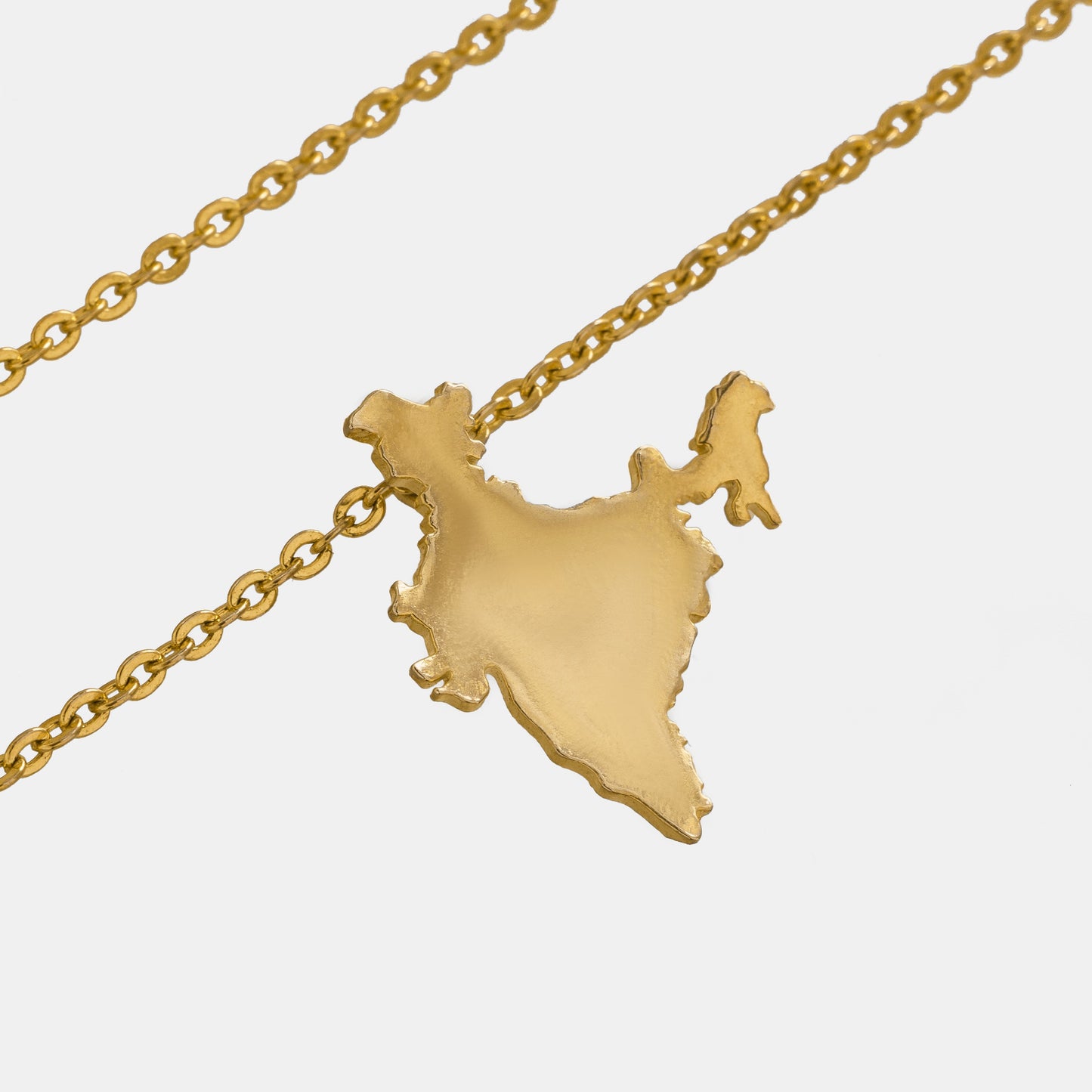 golden chain with a map of india on it