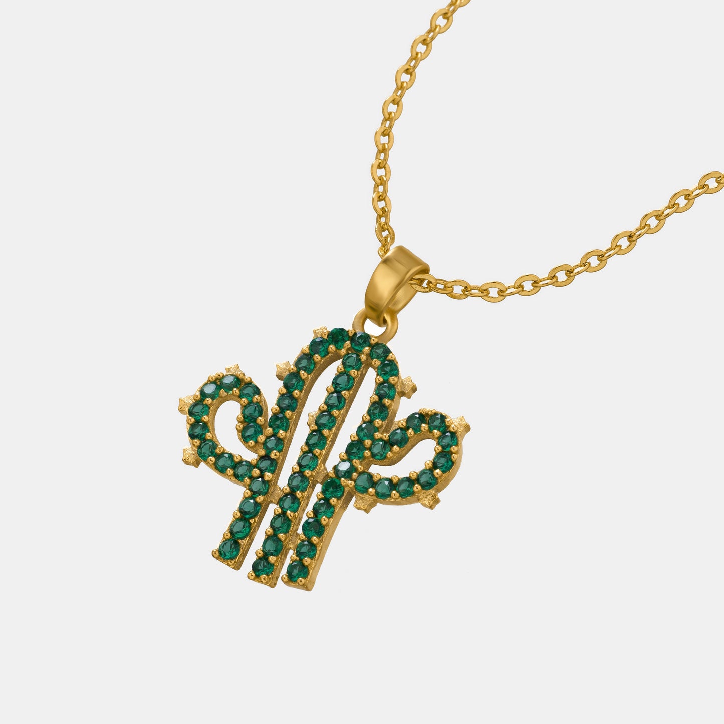 necklace with a cactus charm on it