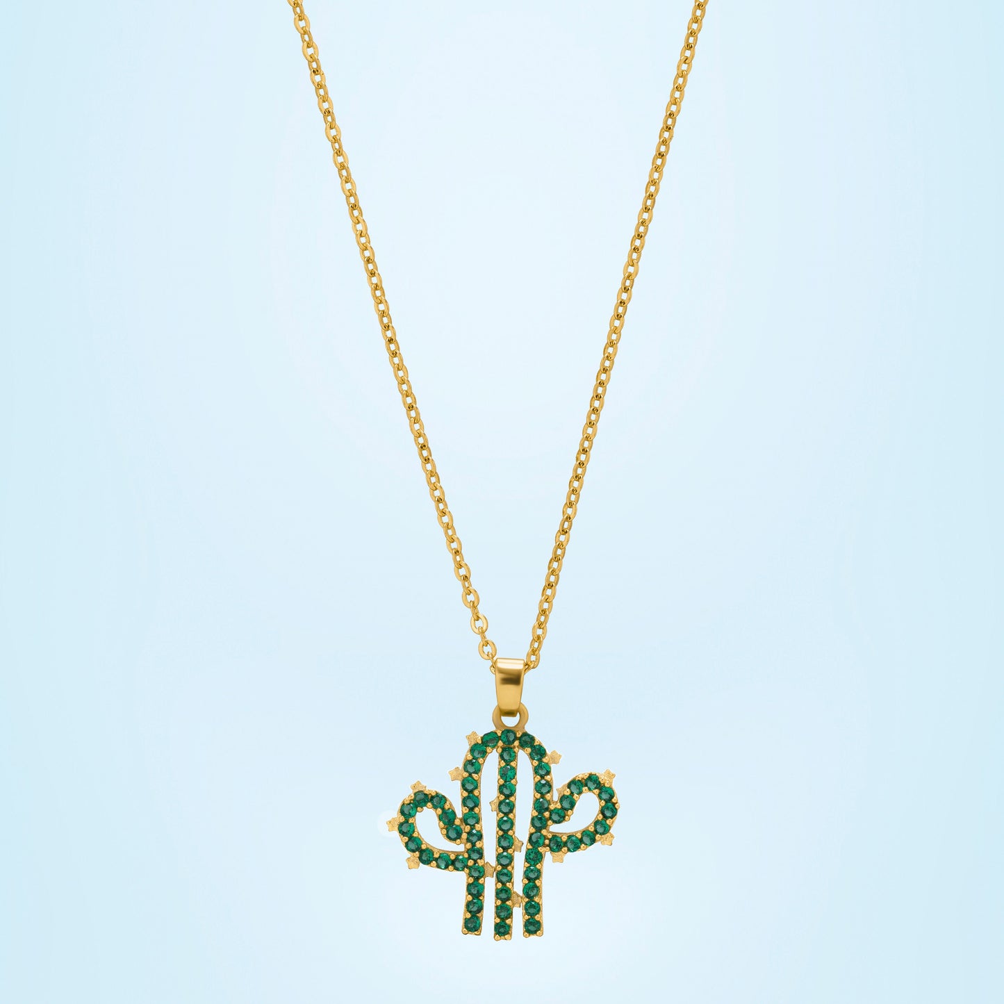 necklace with a cactus charm on it