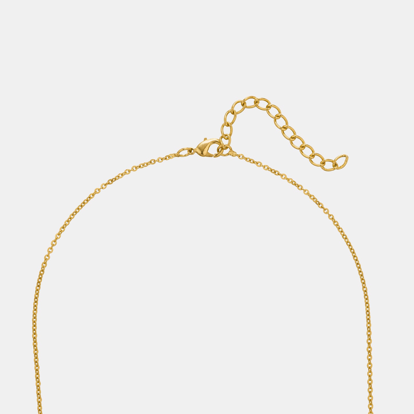 golden necklace with a diamond pendant