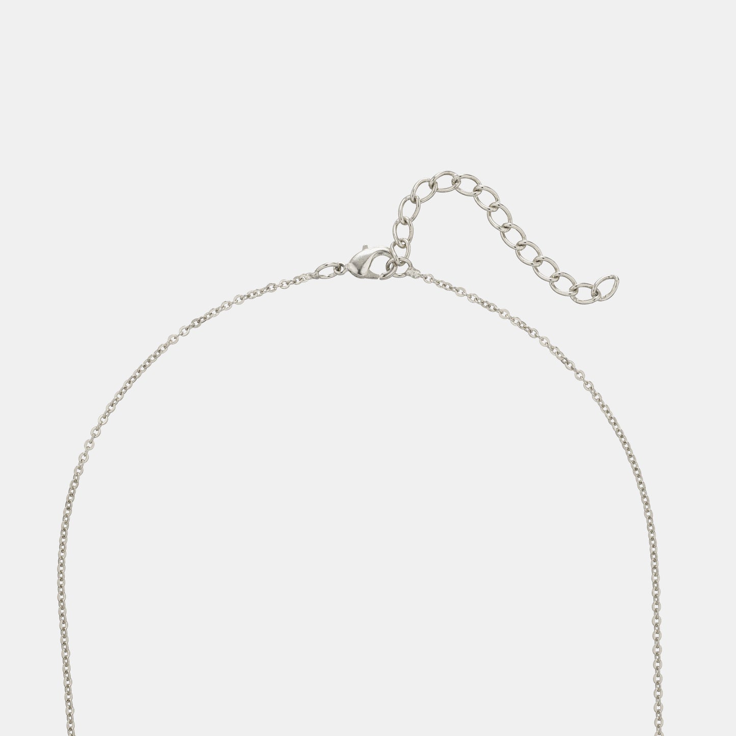 silver necklace with a diamond pendant